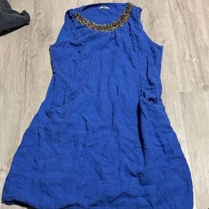 Elegant Blue Sleeveless Dress with Embellished Neckline